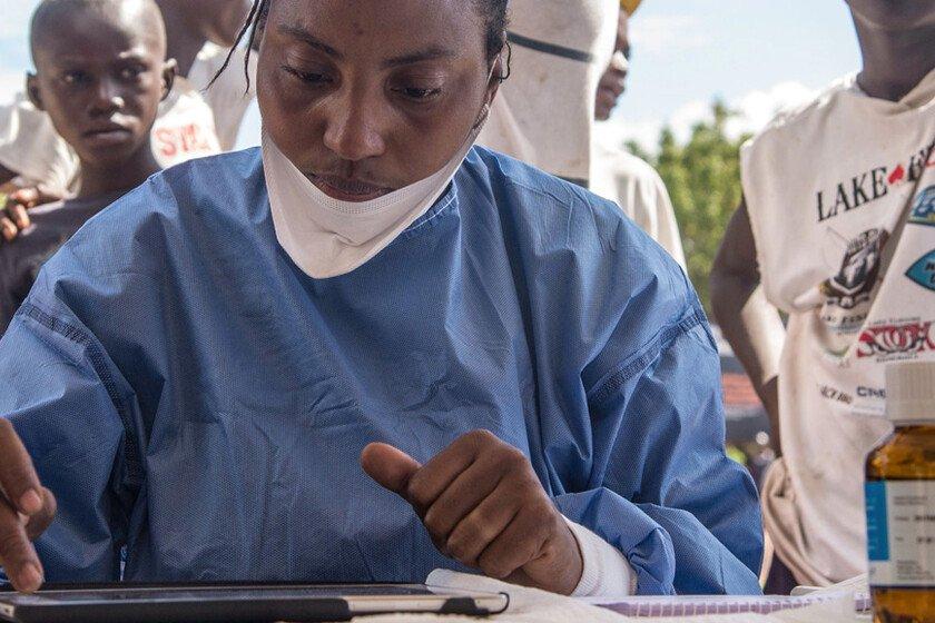 Nurses working with the World Health Organization prepare to administer vaccines in Mbandaka, the Democratic Republic of the Congo, during the launch of the 2018 Ebola vaccination campaign. 