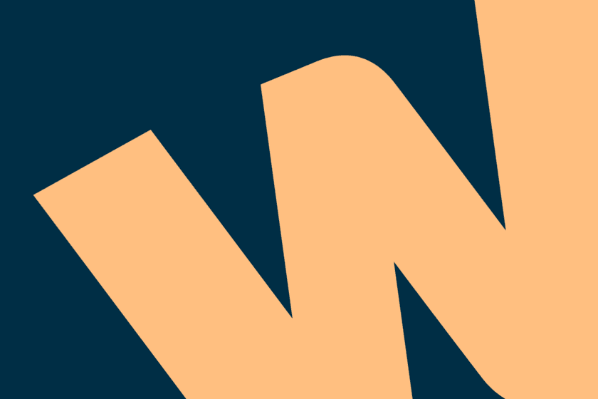 A orange letter W against a blue background.