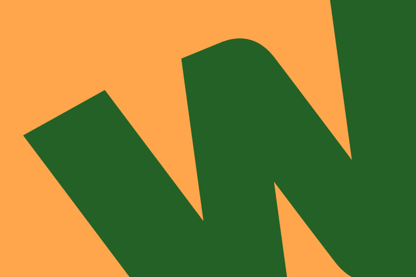 A green letter W against a orange background.