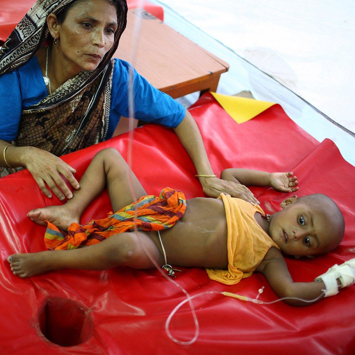 A child with diarrhoea being treated at the International Centre for Diarrhoea Disease Research, Bangladesh. 