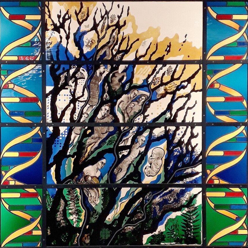 Detail from stained glass designed by Kathy Shaw Urlich, showing DNA and tree of life